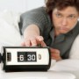 Hitting Snooze Alarm Woman hitting snooze alarm