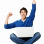Handsome Man Cheering With a Laptop - Isolated